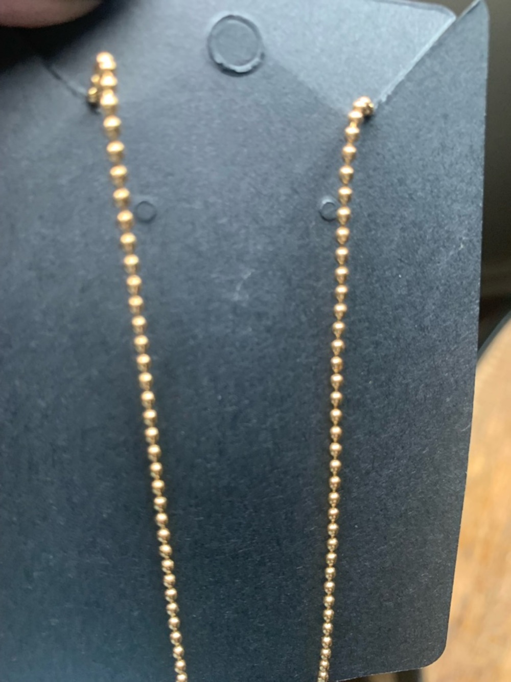 Elegant Gold-Tone Pearl-Trimmed Circle Pendant Necklace - Picture 2 of 3